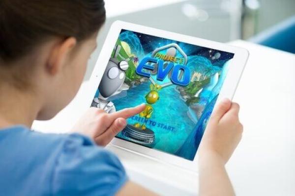 child using touchpad screen