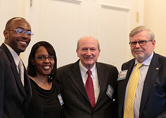 The DCRI celebrates original faculty member Kerry Lee upon his 2016 retirement from Duke after 40 years of service. Pictured L-R: Demoncio Akins, Regina McNair, Kerry Lee, and Frank Rockhold.