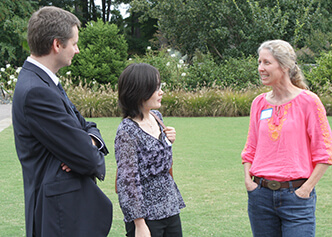 DCRI's Michael Pencina and Yanhong Li chat with colleague Kristina Sigmon during the 2013 Statistics retreat at Duke Gardens.
