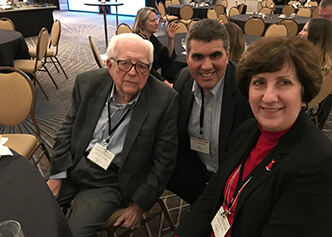 Eric Velazquez and Mary Ann Sellers catch up with Eugene Braunwald during a PIONEER meeting in 2018.