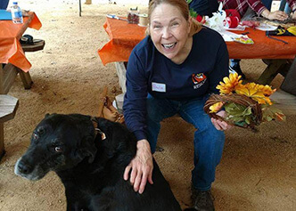  Paula Smith making a four-legged friend during the 2016 Faculty Support retreat at McKee's Cornfield Maze.