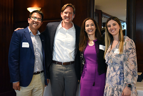 2024 Califf Award recipient Adam DeVore poses with DCRI Fellowship Program Leadership during an awards ceremony.