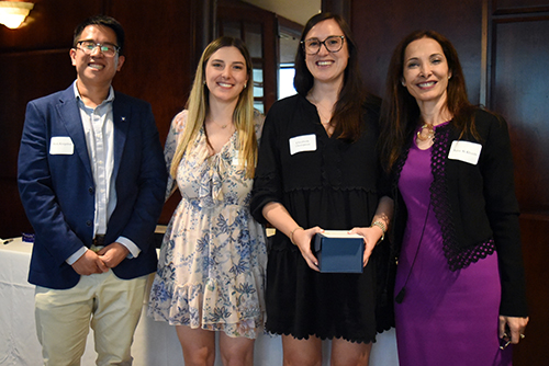 2024 Peterson Award recipient Elizabeth Thompson poses with DCRI Fellowship Program Leadership during an awards ceremony.