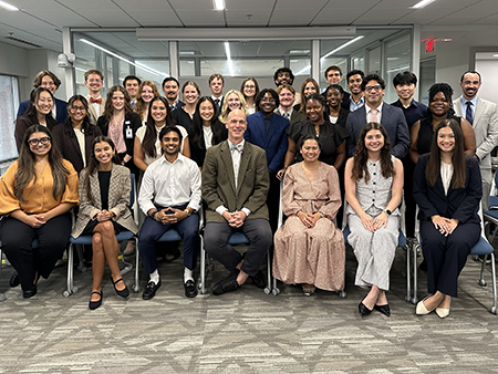 Group photo of program participants and faculty gathered in a conference room during the STAR 2026 program.