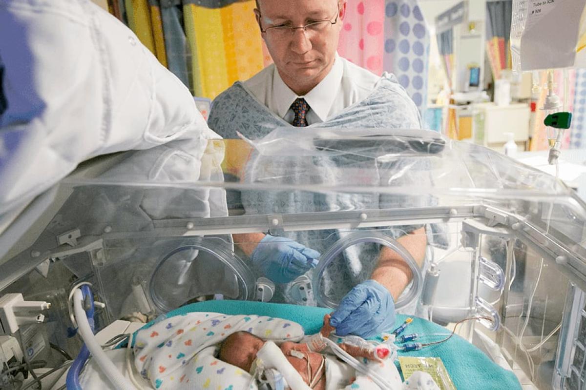 doctor checking a baby