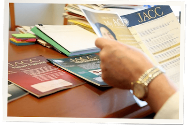 Hand holding a publication